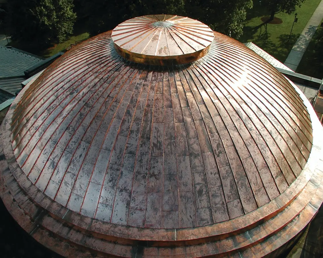 Craftsman Roofing crew installing a new roof in Busti